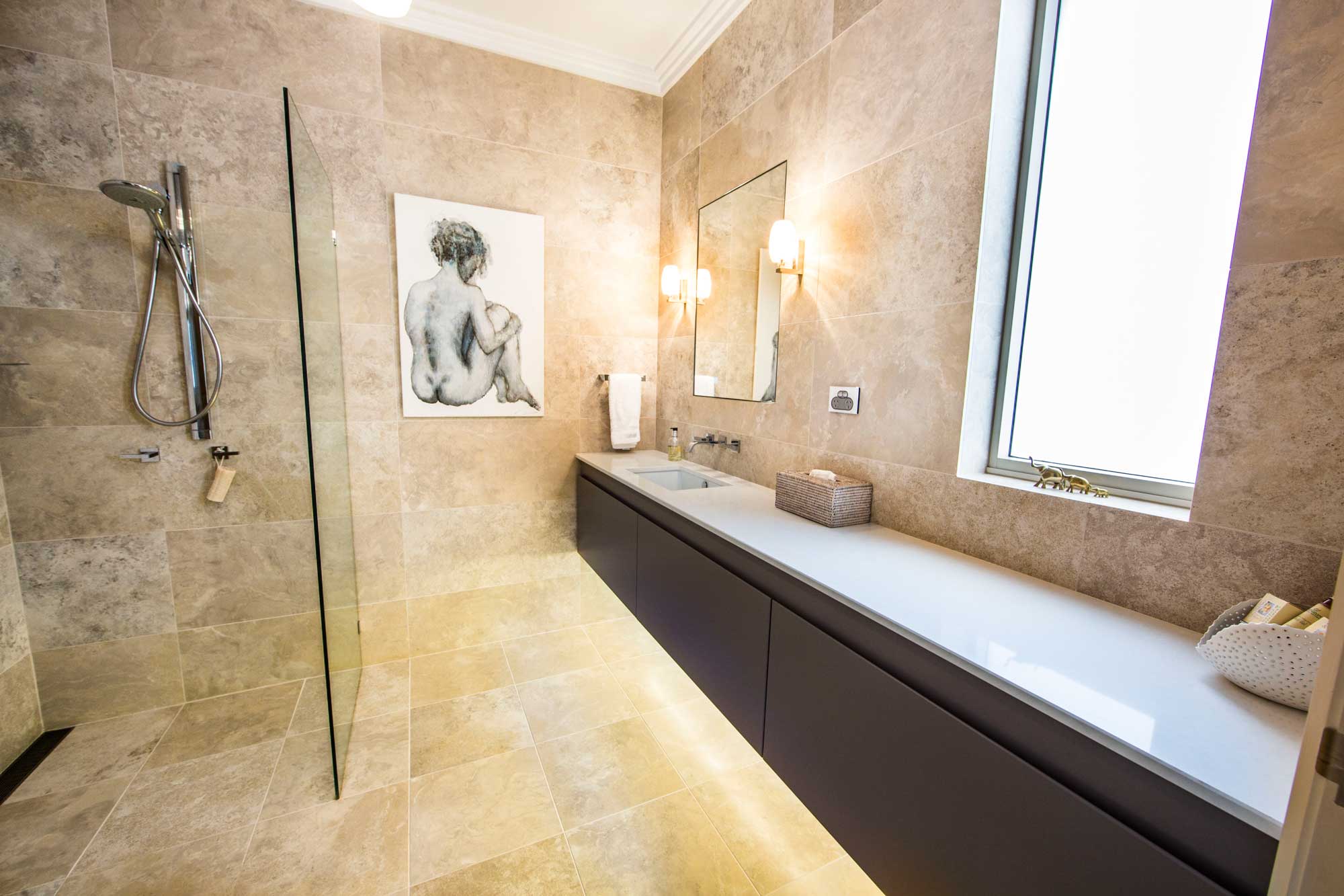 Neutral tones and sleek lines create a show-stopping bathroom